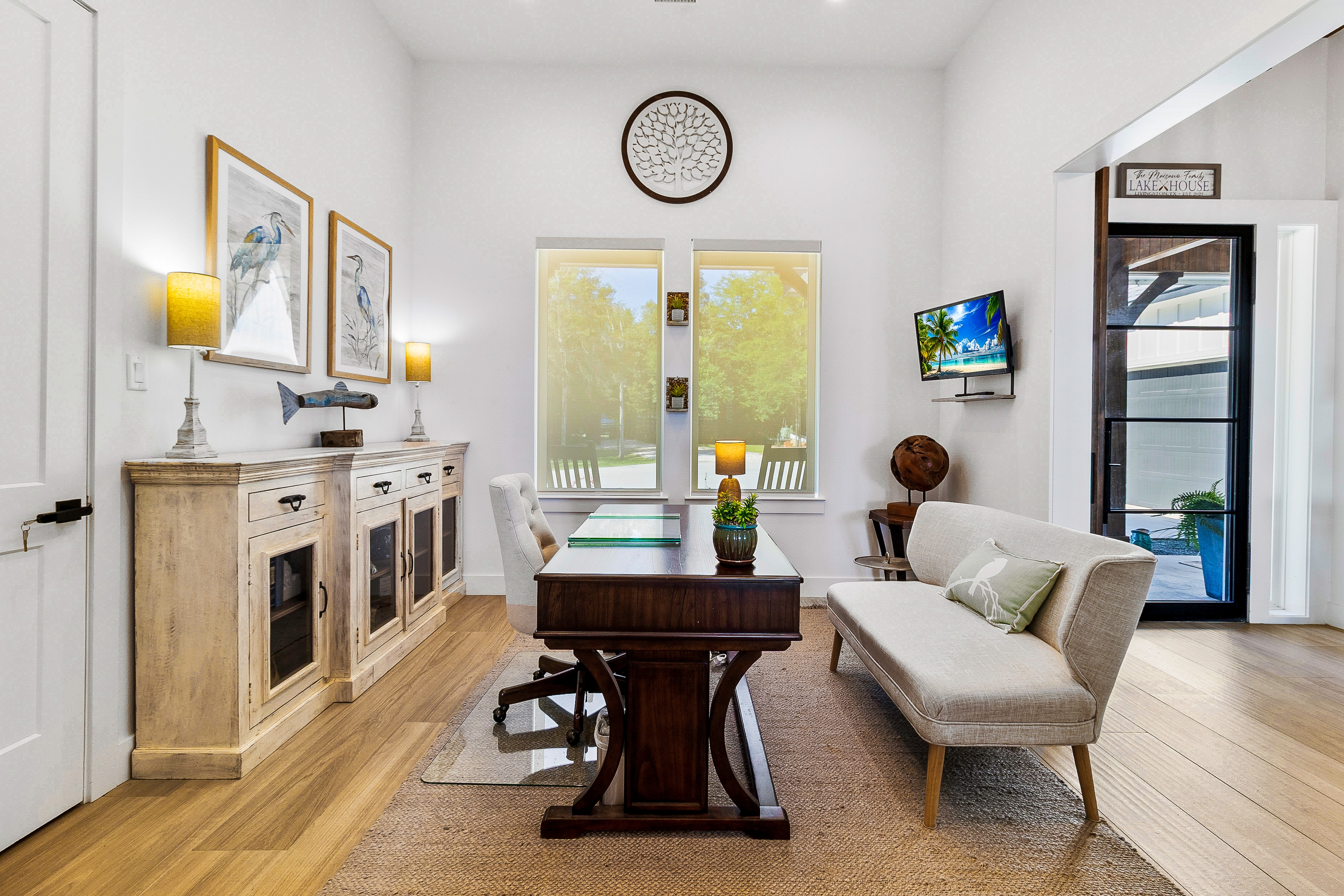 Living room with piano and seating area