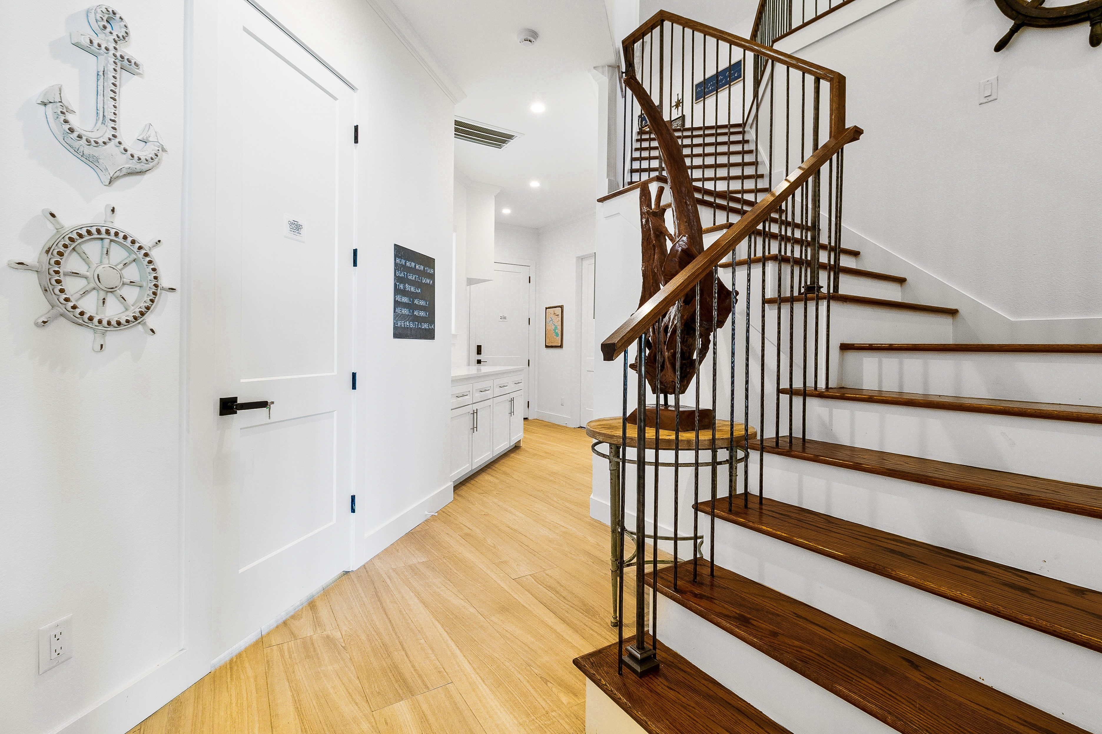 Modern staircase with wooden steps and metal railing