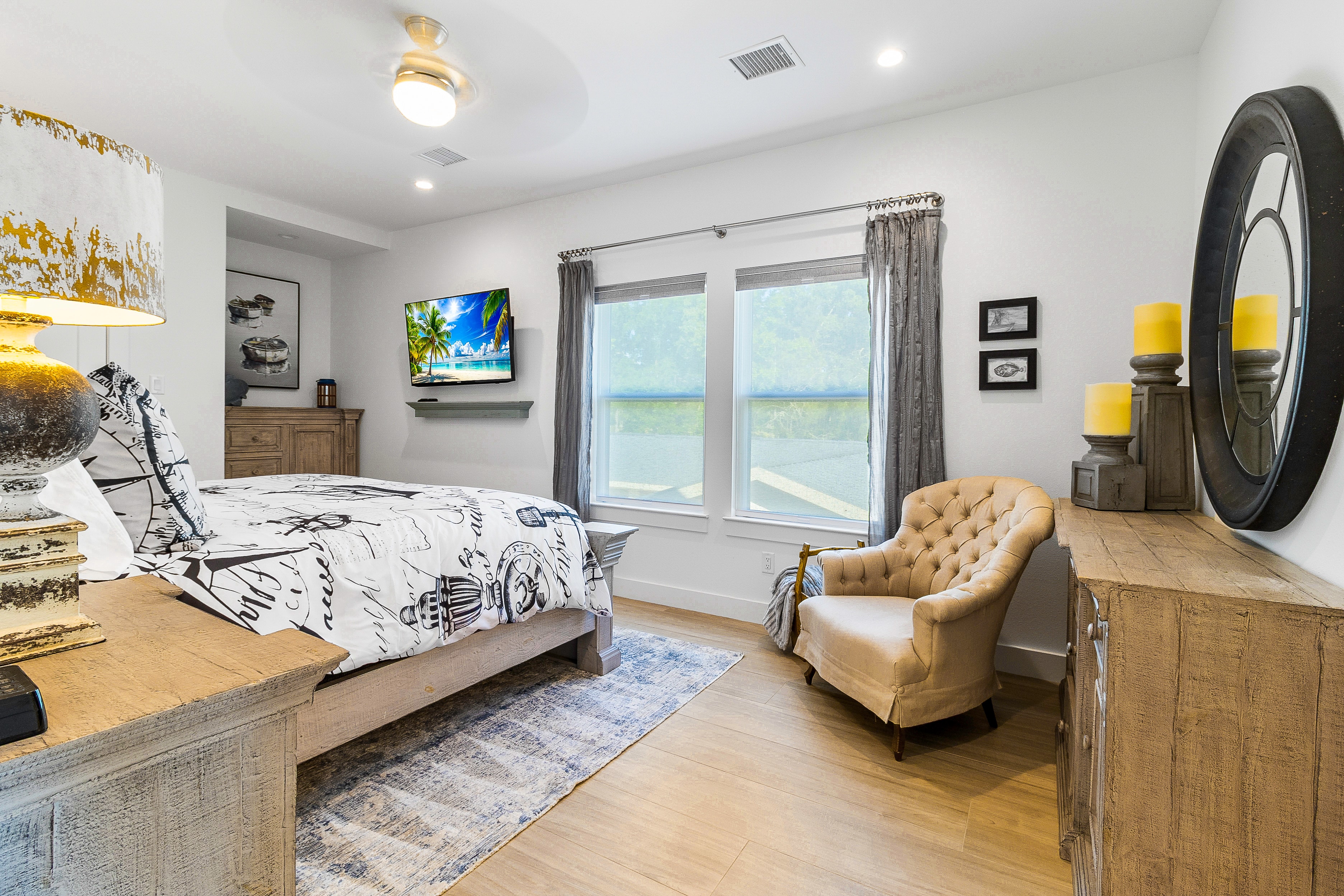 Bedroom with lake view and armchair