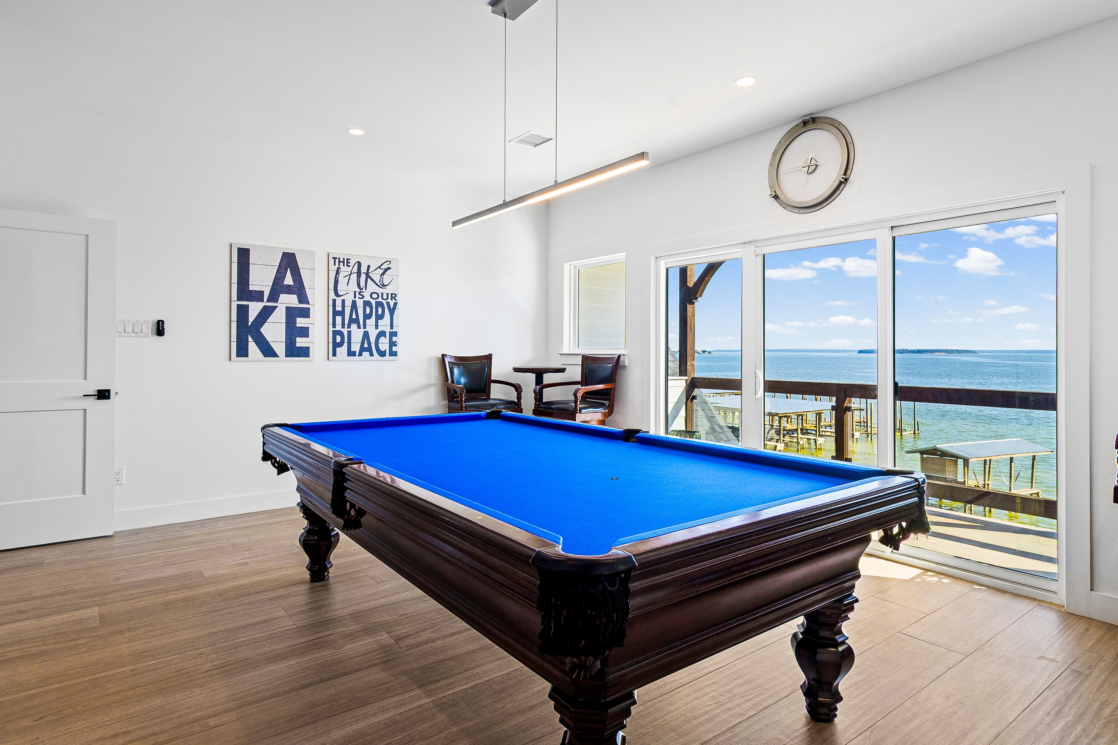 Lakehouse game room with pool table