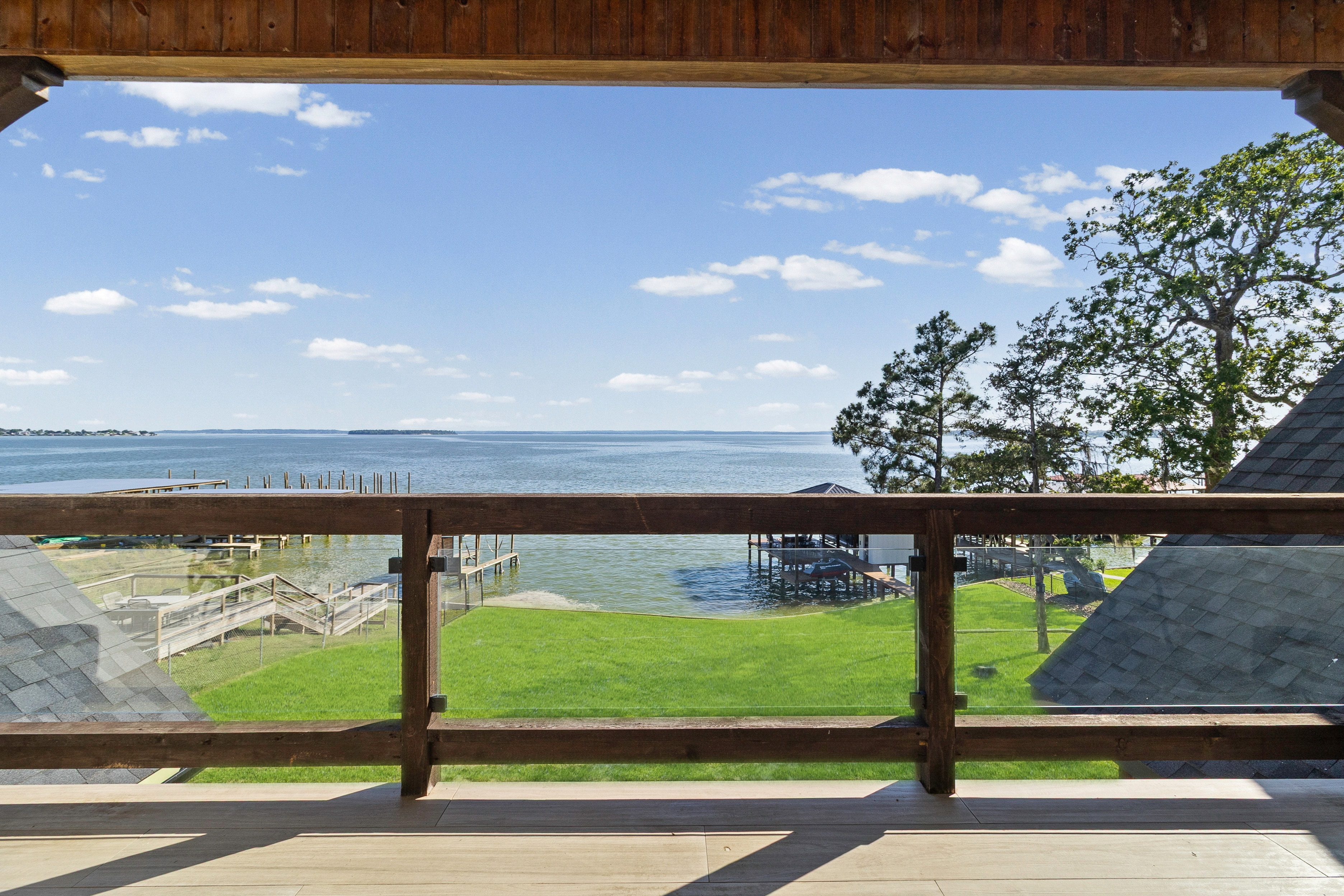 Covered deck with view overlooking the bay