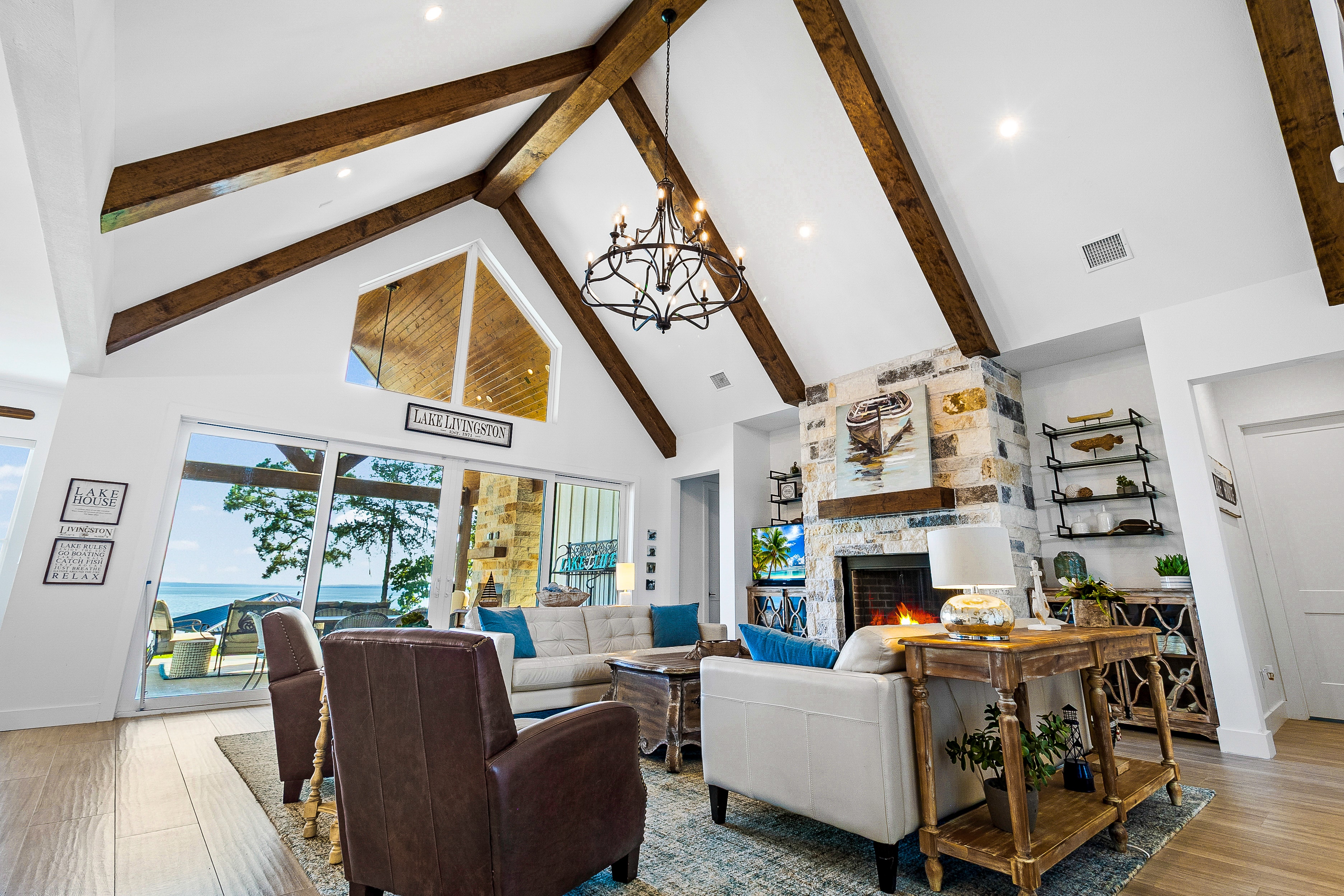Living room with exposed beams and fireplace