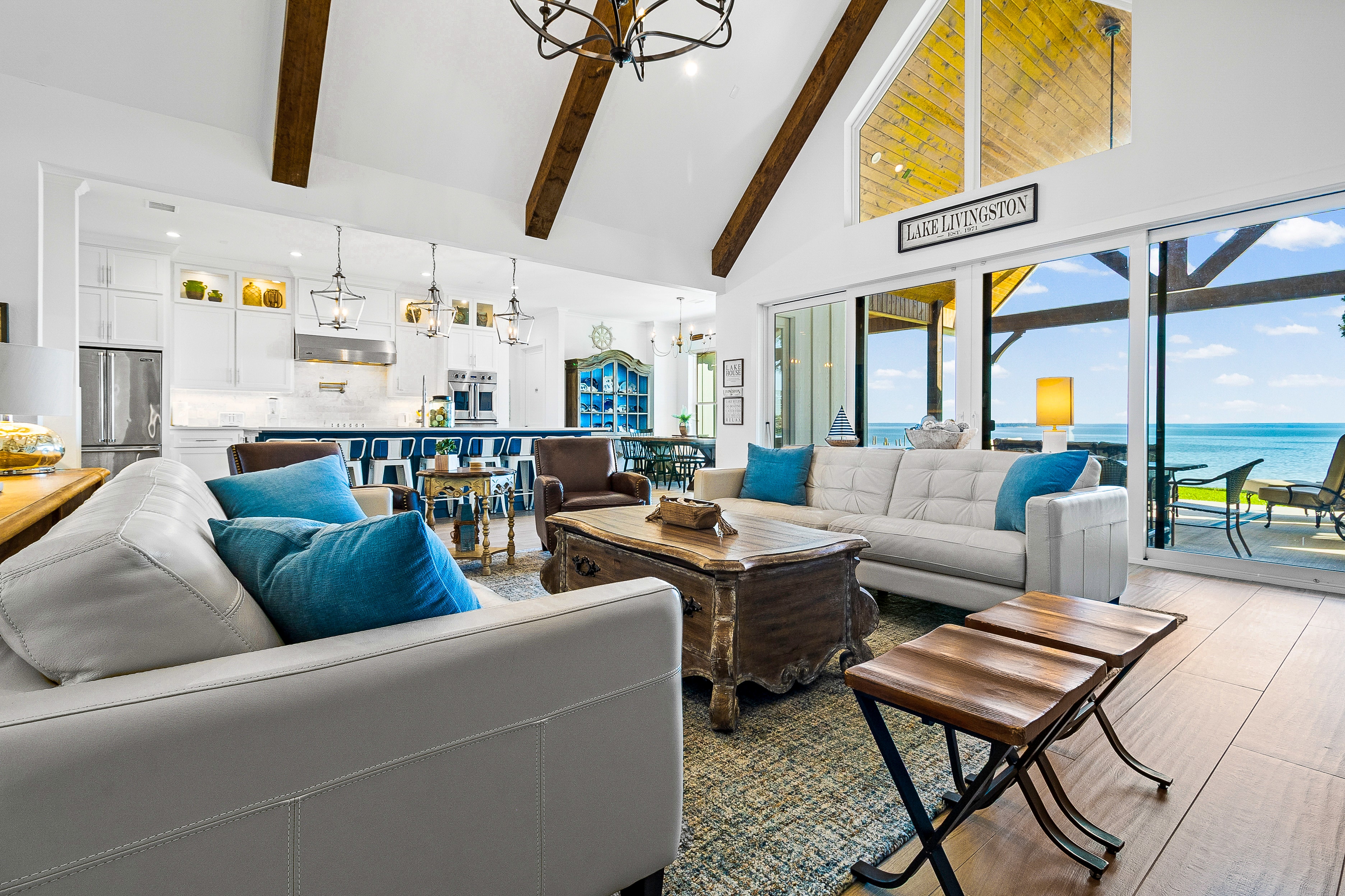 Open concept living room with lake views