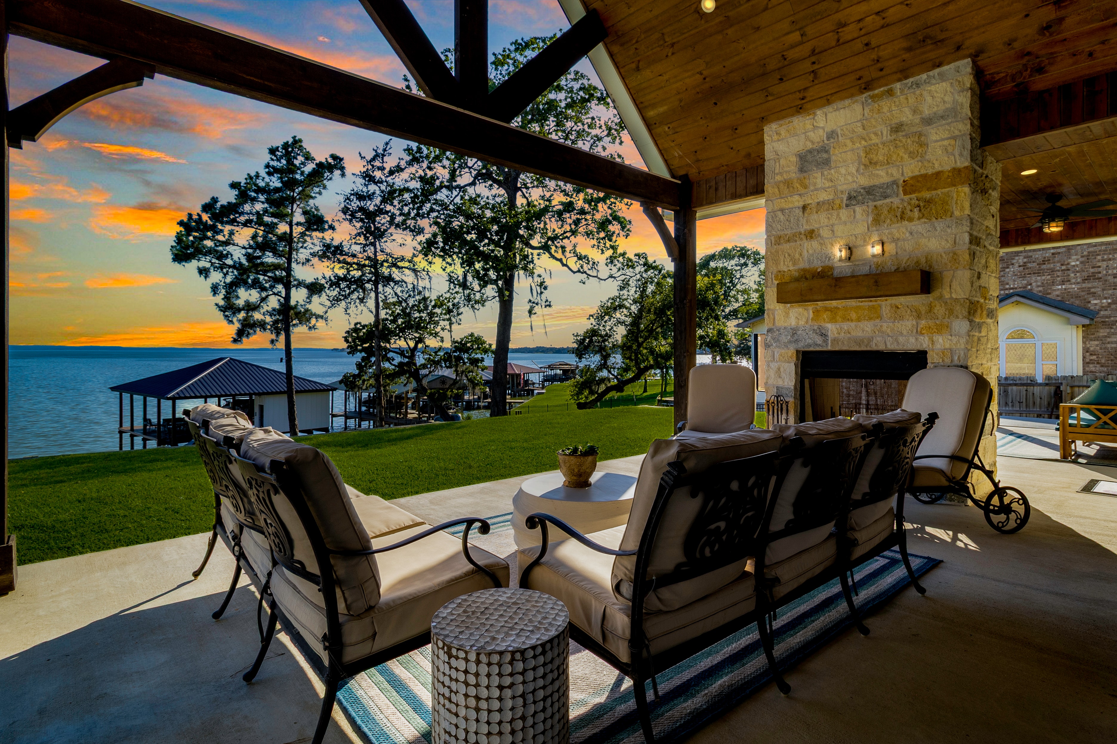 Lakefront patio at sunset — Livingston Lake House